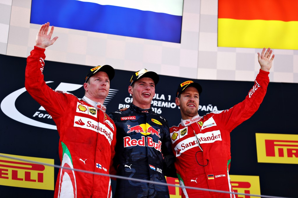 MONTMELO, SPAIN - MAY 15: Max Verstappen of Netherlands and Red Bull Racing celebrates on the podium with Kimi Raikkonen of Finland and Ferrari and Sebastian Vettel of Germany and Ferrari during the Spanish Formula One Grand Prix at Circuit de Catalunya on May 15, 2016 in Montmelo, Spain.  (Photo by Clive Mason/Getty Images)