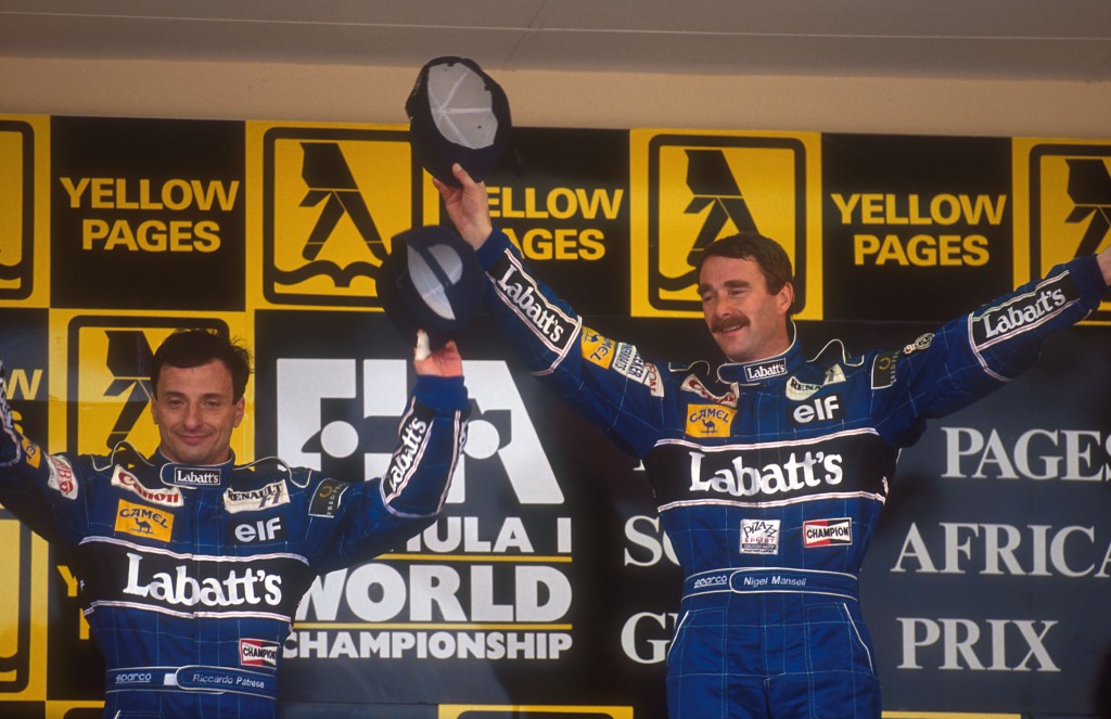 1992 South African Grand Prix. Kyalami, South Africa. 28/2-1/3 1992. Nigel Mansell, 1st position with teammate Riccardo Patrese, 2nd position (both Williams Renault) on the podium. Ref-92 SA 06. World Copyright - LAT Photographic